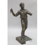 A bronze figure of a man