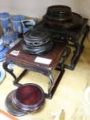 A collection of Oriental hardwood stands and a pith painting