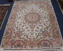 A Tabriz rug 200x 153cm