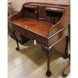 A Chippendale style mahogany writing desk W.107cm