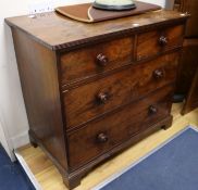 An early 19th century mahogany chest, of two short and two long drawers W.93cm