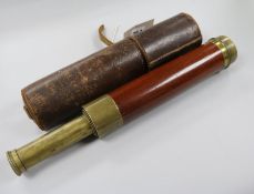 A four draw telescope in leather case, Troughton and Simms