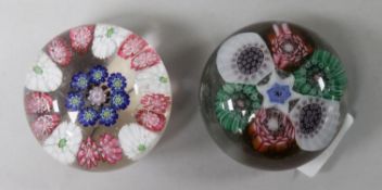 A 19th century Clichy garland paperweight and another French millefleur paperweight