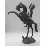 A bronze horse and rider
