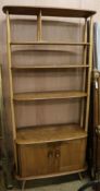 An Ercol elm room divider W.90cm