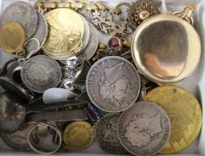Mixed coins, medals, brooches and a boxed watch opening tool.