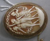 An Italian 9ct cameo brooch carved with the Three Graces, 59mm.