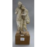 After the antique. A plaster group of classical lovers, on hardwood stand