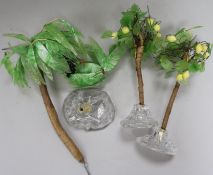 An ornamental glass palm and lemon trees