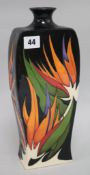 A stylish Moorcroft black ground vase