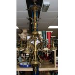 A four branch brass chandelier