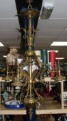 A four branch brass chandelier