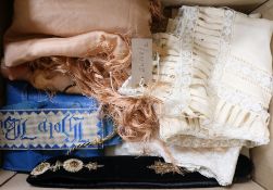 A pink shawl, doll hankies and a christening gown