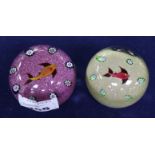 Two Paul Ysart 'fish' paperweights; one pink ground and one beige ground