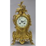 A French Louis XV ormolu clock with dolphin design
