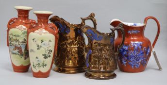 Two Victorian copper lustre jugs, a pair of vases and a jug