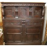 An oak court cupboard