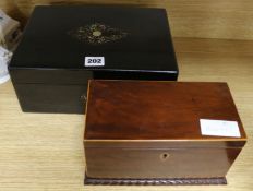 An ebonised mother of pearl box and tea caddy