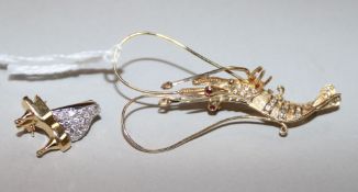 A 14ct yellow gold and diamond 'lobster' brooch and an 18ct yellow gold and diamond 'piano' brooch