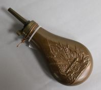 A copper powder flask.