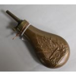 A copper powder flask.