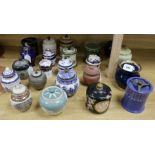 A collection of small ceramic tobacco and other jars and covers, including Carlton examples (23)