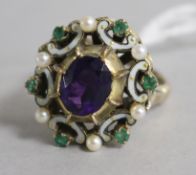 A 1970's Victorian style 9ct gold, amethyst and enamel dress ring, size P.