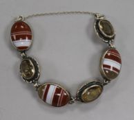 A sterling silver citrine and banded agate set bracelet.