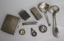 A Victorian silver sifter spoon, a sterling spoon, a silver cigarette case, a silver Howitt