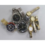 Seven assorted wrist watches including Seiko and a pocket watch.