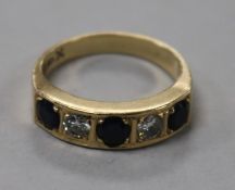 A 14ct gold, sapphire and diamond five stone half hoop ring, size M.