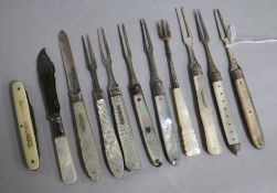 Seven 19th century and later silver and mother of pearl handled travelling forks a similar silver