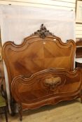 A French walnut bedstead, W.152cm