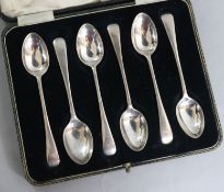 A cased set of six 1930's silver old English pattern coffee spoons.