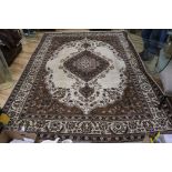 A cream ground Tabriz carpet, 350 x 246cm
