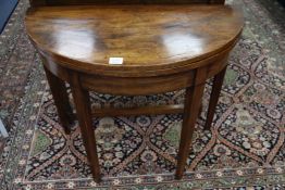 A George III mahogany demi lune tea table (a.f.)