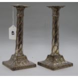 A pair of 18th century plated candlesticks