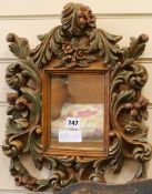 A modern Florentine design acanthus carved wall mirror, W.33cm