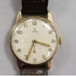 A gentleman's 9ct gold Tudor wrist watch.