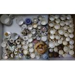 A large collection of miniature porcelain mugs and other ceramics including Royal Worcester, Royal