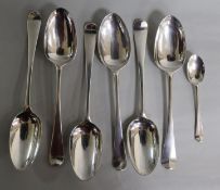 Six assorted Georgian silver Hanovarian table spoons and one teaspoon.