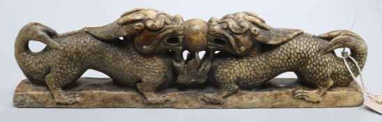 A Chinese stone confronting dragon scroll weight