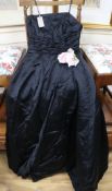 A 1950's black satin evening dress