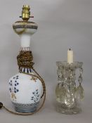 A Victorian glass lustre and a glass table lamp