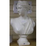 A plaster bust of a lady