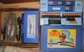 A Hornby Dublo 1954 train set, Duchess of Montrose, with extra carriages, station and tracking