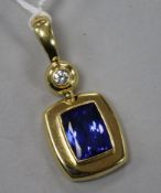 An 18ct gold, tanzanite and diamond drop pendant, overall 41mm.