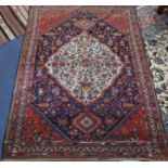 A Shiraz cream ground medallion rug, 196cm x 134cm