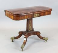 A Regency brass inlaid rosewood card table, with D shaped top on rectangular stem and kneed