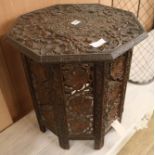 An Indian carved wood octagonal table, W.46cm